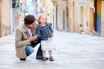 Image showing Father and daughter in city