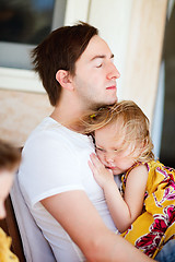 Image showing Father and daughter relaxing