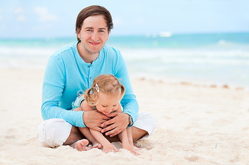 Image showing Father and daughter at beach