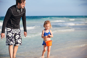 Image showing Father and daughter at beach