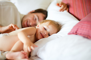 Image showing Father and daughter in bedroom