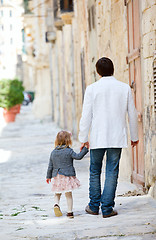 Image showing Father and daughter outdoors in city