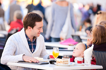 Image showing Family at outdoor cafe