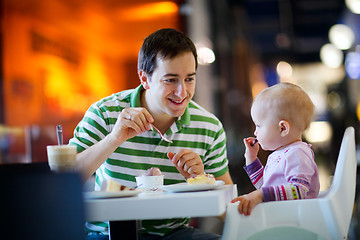 Image showing Father and daughter in cafe