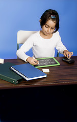 Image showing little girl writing on board