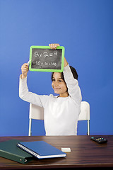 Image showing little girl showing chalkboard