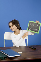 Image showing little girl showing chalkboard