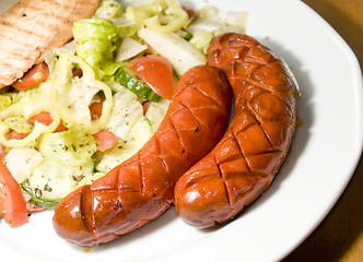 Image showing debrecziner Hungarian sausage with salad