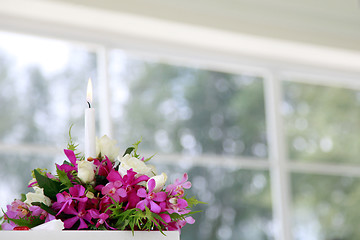 Image showing Candle burning inside a church.