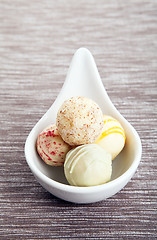 Image showing mixed truffle pralines on a plate 