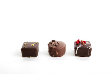 Image showing collection of different chocolate pralines isolated 