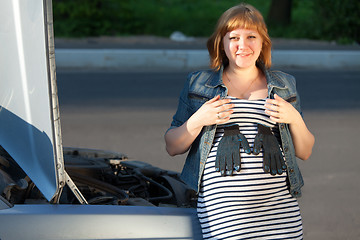 Image showing Pregnant Woman Near the Broken Car 