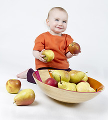 Image showing baby with apples