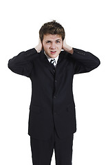 Image showing man plugging his ears