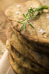 Image showing Homemade rustical crackers with rosemary