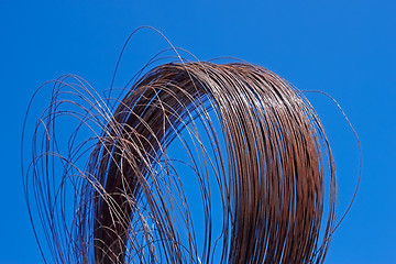 Image showing Rusty wire against blue sky