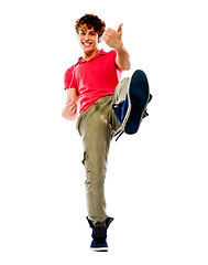 Image showing Smart guy playing imaginary guitar