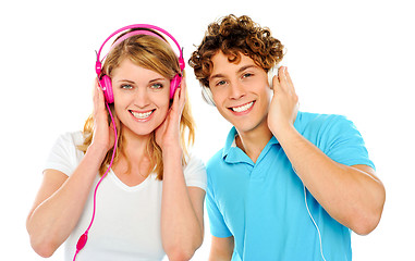 Image showing Couple enjoying music through headphones