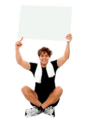 Image showing Athlete pointing towards blank banner ad