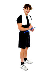 Image showing Full length portrait of male fitness trainer
