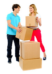 Image showing Couple carrying cardboard boxes