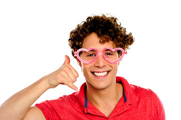 Image showing Boy posing with heart shape eye-wear