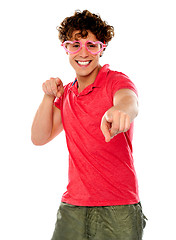 Image showing Handsome guy pointing at camera