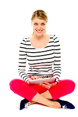 Image showing Beautiful woman using her tablet pc