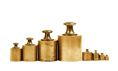 Image showing set of precision weights for a balance scale