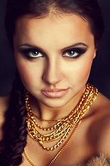 Image showing Portrait of a beautiful woman with golden chains