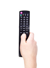 Image showing Hand with TV remote control