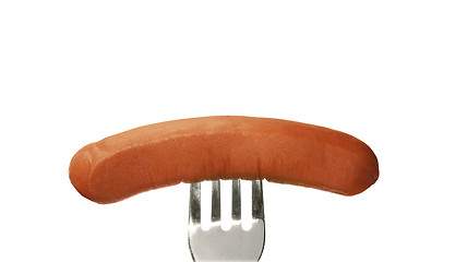 Image showing Close up of sausage and fork isolated on white background