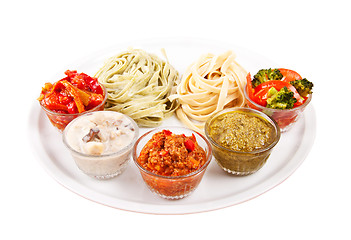 Image showing two italian tagliatelles and five various condiments