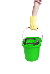 Image showing Human hand holding empty plastic bucket container