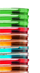 Image showing Stack of colorful Petri dishes isolated