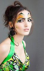 Image showing beautiful girl in green dress and with indian make up