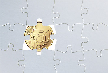 Image showing Puzzle and coin