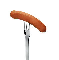 Image showing close up of sausage and fork