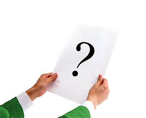 Image showing businessman holding a white paper with a question mark