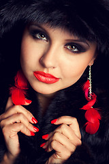 Image showing Beautiful young woman wearing fur hat