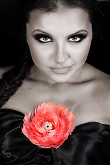 Image showing Young beautiful woman with rose