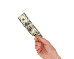 Image showing A man's hand holding a one hundred dollar bill