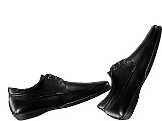 Image showing The black man's shoes isolated