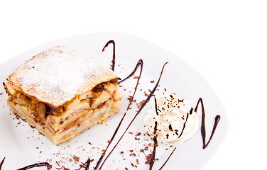 Image showing slice cake and ice cream on plate