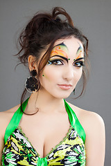 Image showing beautiful girl in green dress and with indian make up