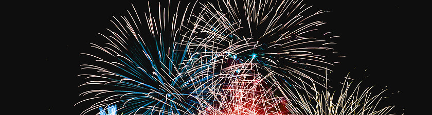 Image showing Colorful fireworks of various colors over night sky