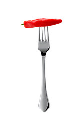Image showing hot chilli pepper on fork isolated