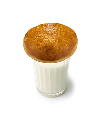 Image showing milk and bun isolated on white