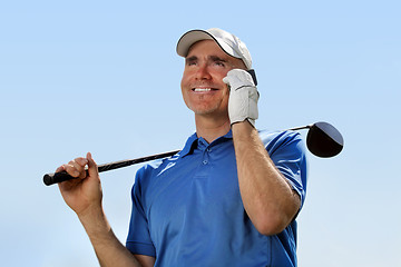 Image showing Golfer using mobile phone 