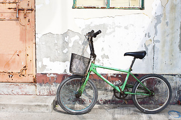 Image showing Old bicycle along the street